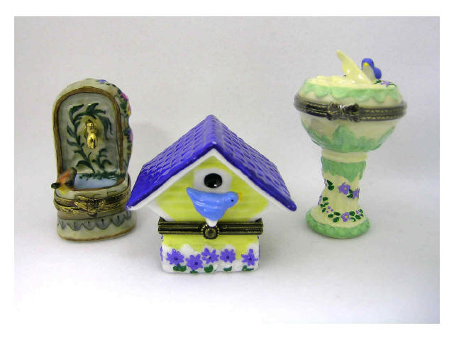 Appraisal: Lot of three Limoges hinged porcelain boxes including bird house