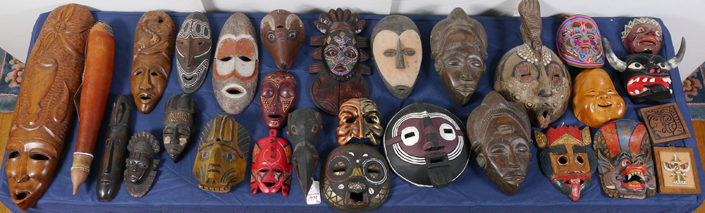 Appraisal: LARGE COLLECTION OF DECORATIVE MASKS carved and decorated masks from