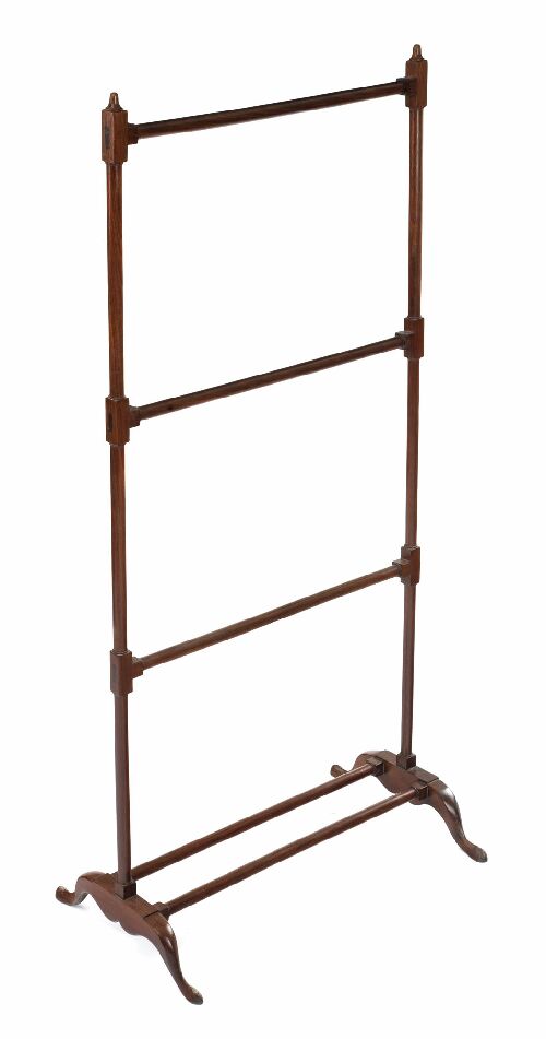 Appraisal: A Victorian mahogany towel rail of turned construction with block