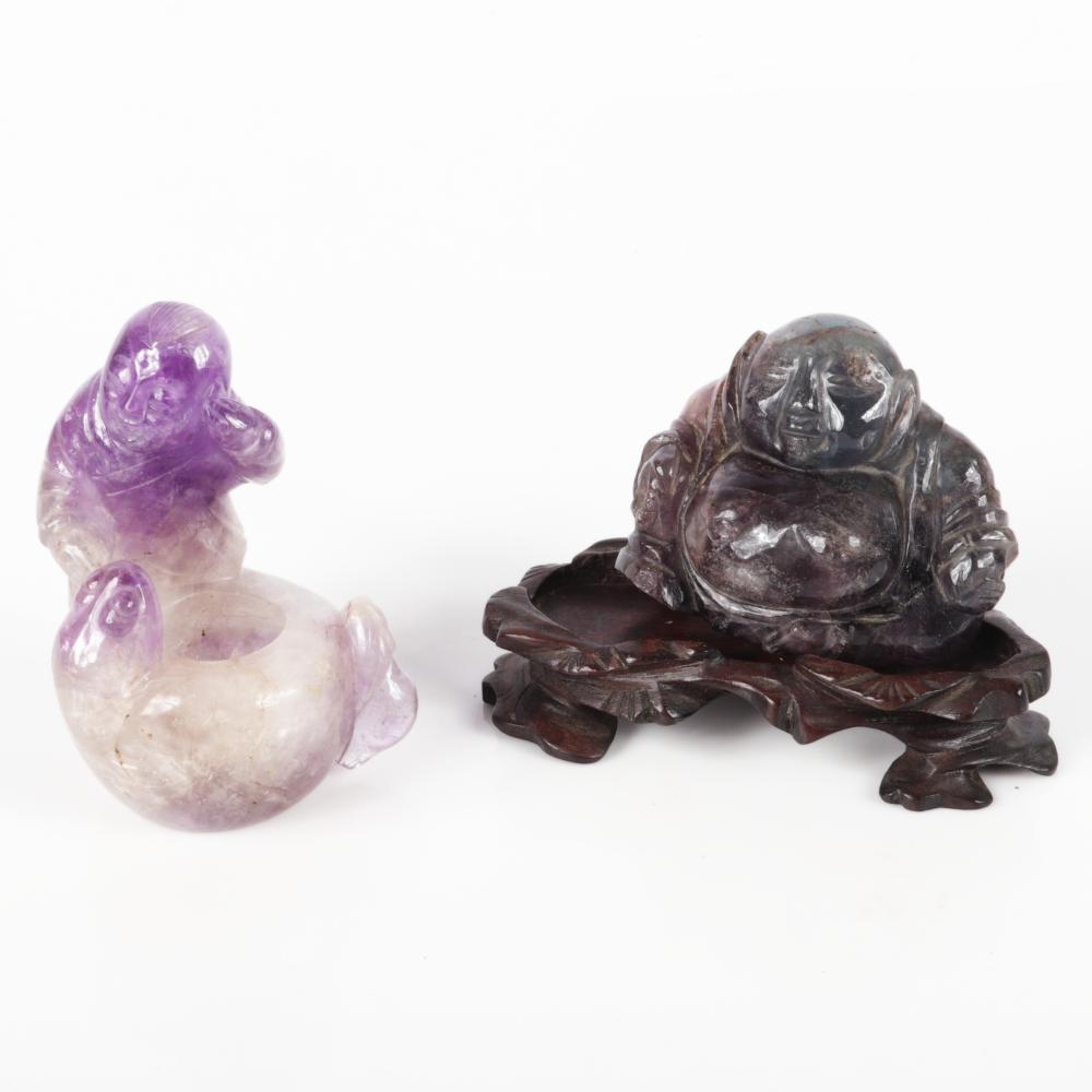 Appraisal: TWO ASIAN QUARTZ FIGURE CARVINGS AMETHYST FOLKLORE BOY AND FISH