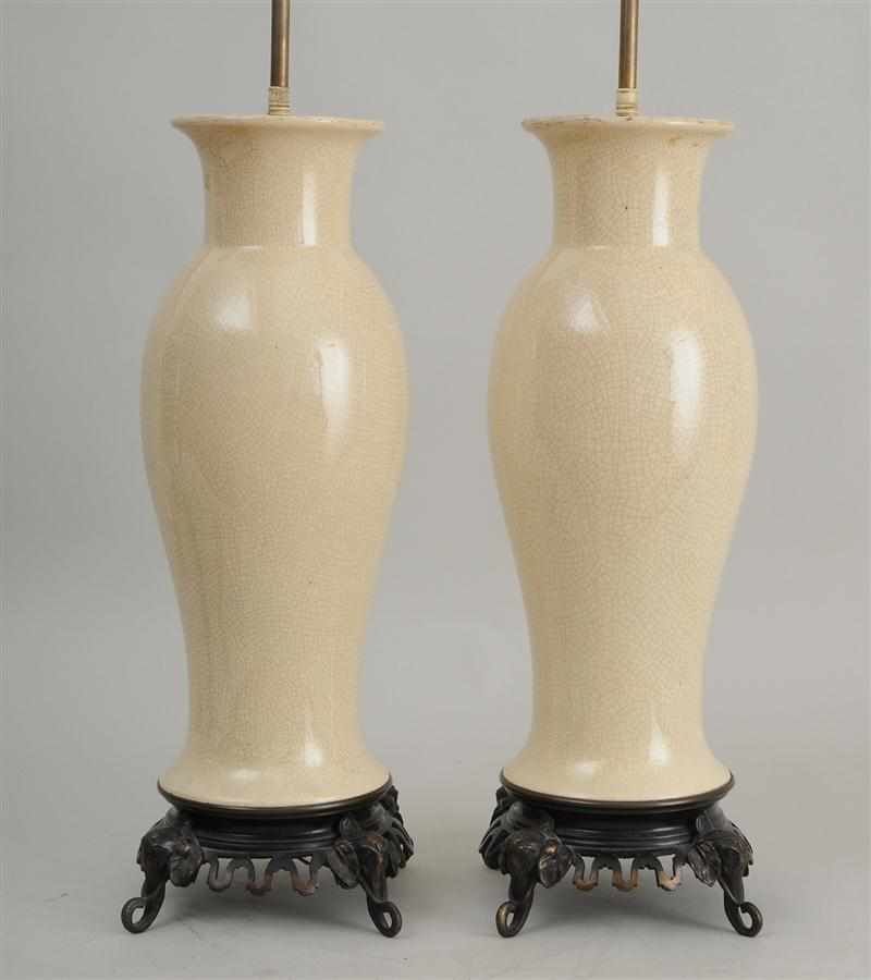 Appraisal: PAIR OF CHINESE IVORY CRACKLED GLAZE PORCELAIN BALUSTER-FORM VASES MOUNTED