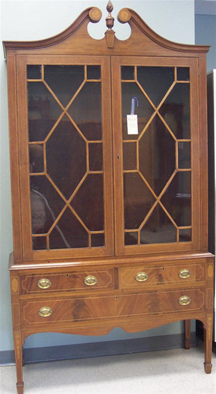 Appraisal: Hepplewhite style inlaid mahogany scroll top piece china cabinet h