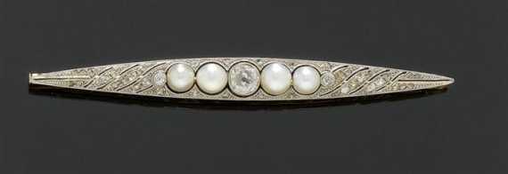 Appraisal: PEARL AND DIAMOND BROOCH ca Platinum over yellow gold Decorative