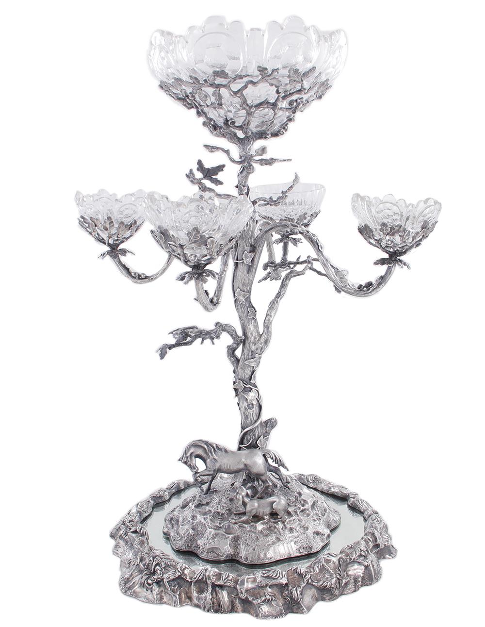 Appraisal: English silverplate figural epergne and plateau circa glass bowls supported