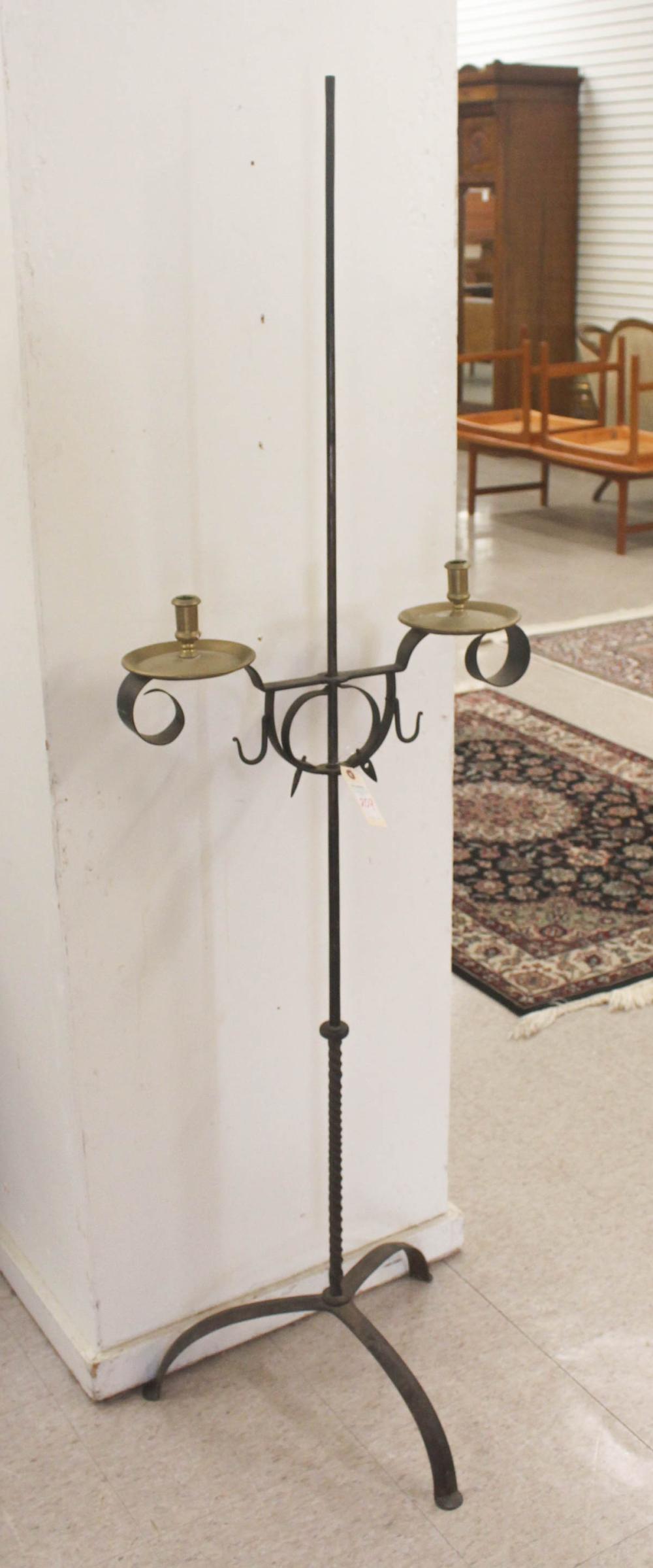 Appraisal: COUNTRY BRASS AND FORGED IRON CANDLE STAND twin candlestick design