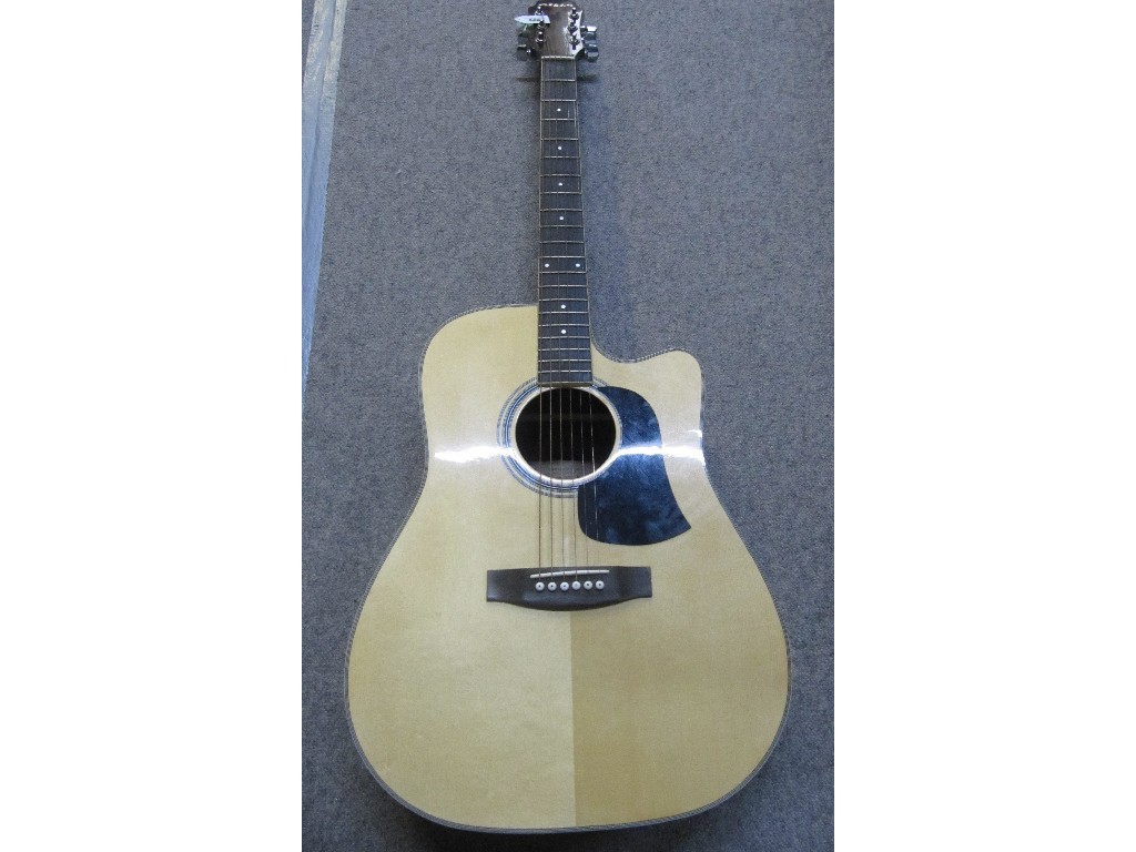 Appraisal: An Aria six string acoustic guitar