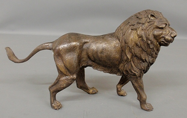 Appraisal: - Bronze standing lion th c h x l x