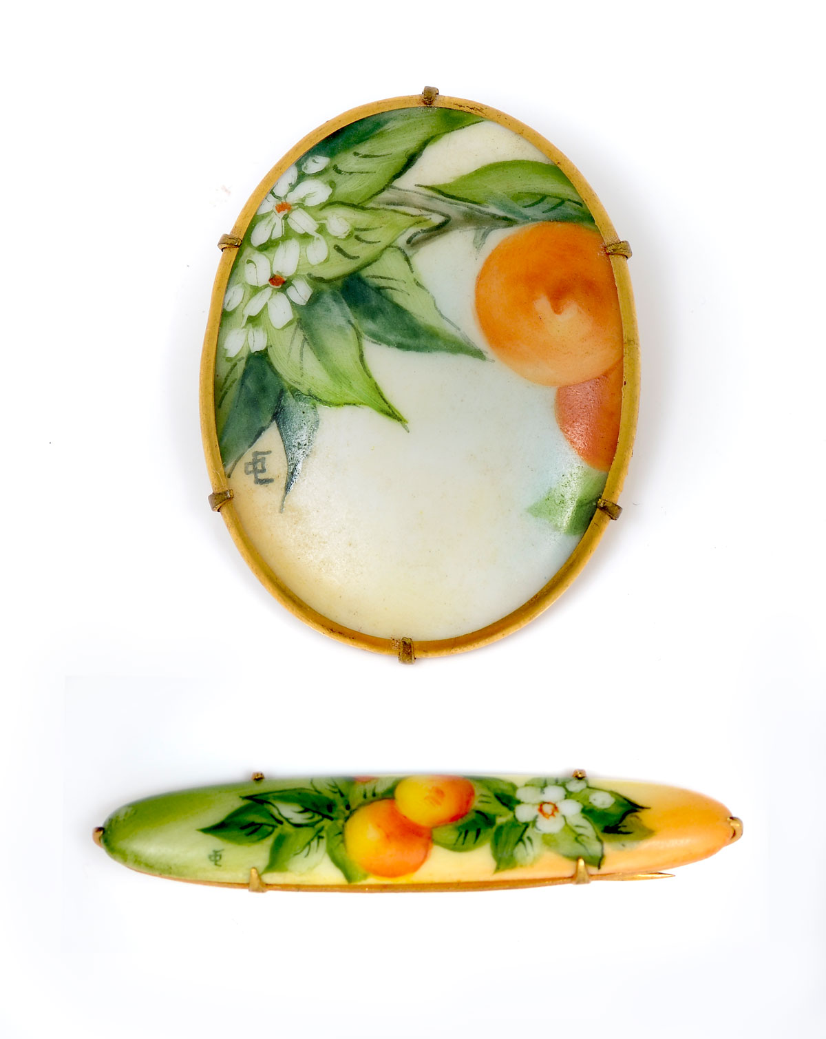 Appraisal: PIECE OLIVE COMMONS CAMEONAS Both brooches have similar scenes of