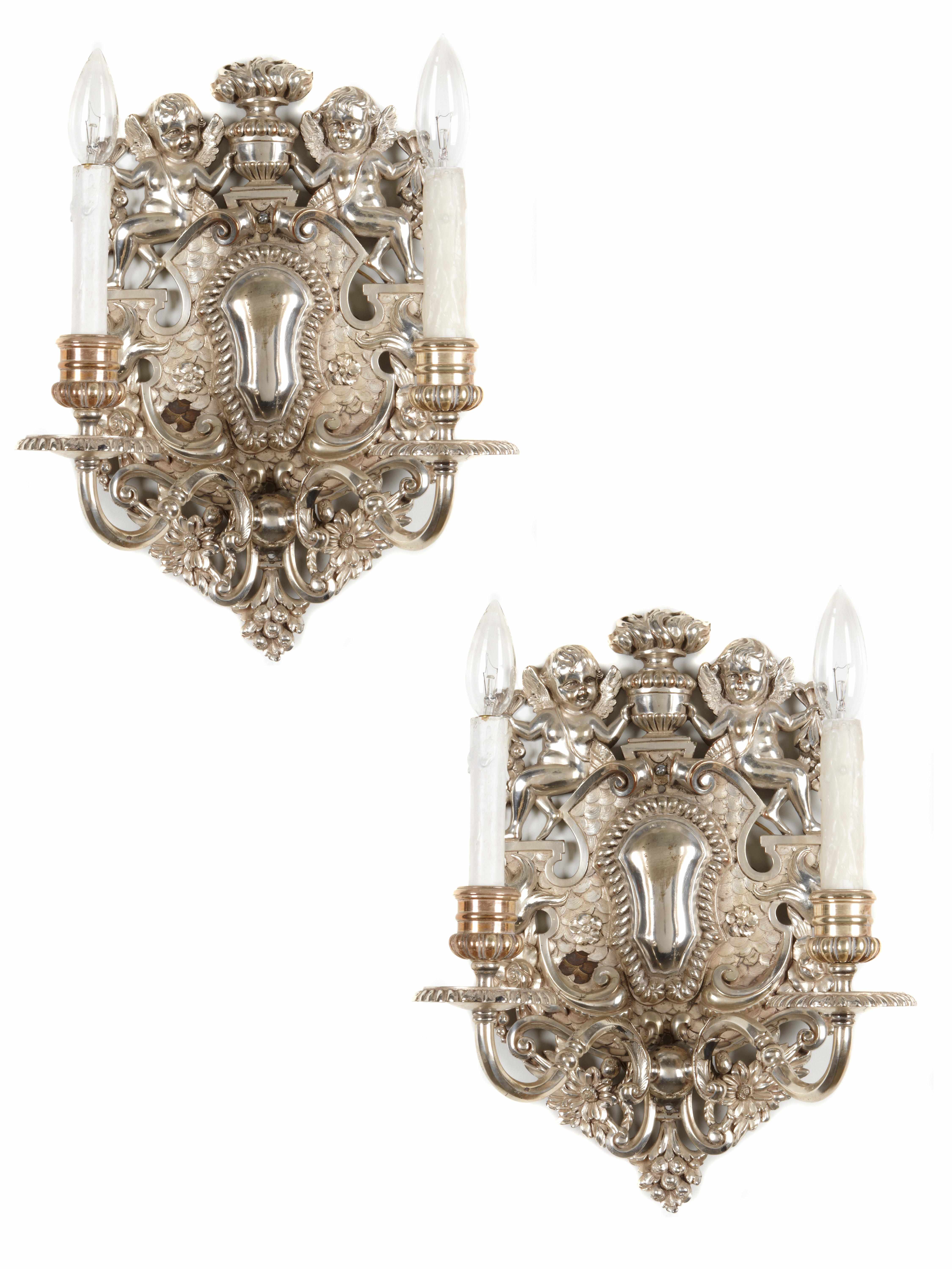 Appraisal: A pair of Charles II style silver plated two light