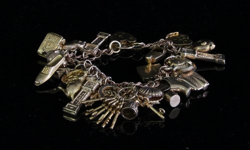 Appraisal: A ct gold fancy-link bracelet with heart shaped padlock clasp