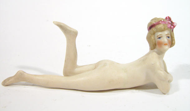 Appraisal: Continental reclining bisque nude figurine cm in length