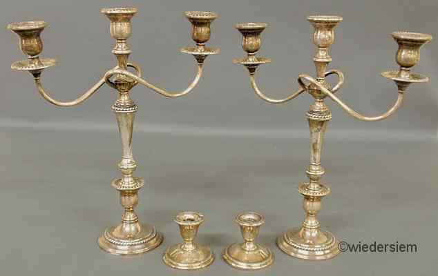 Appraisal: Pair of weighted sterling silver candelabra ''h and pair of