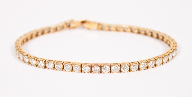 Appraisal: Lady's K gold and diamond tennis bracelet in L containing