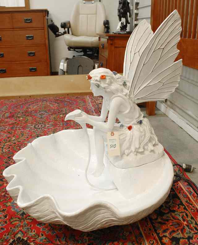 Appraisal: FIGURE AND BASIN GARDEN FOUNTAIN of molded fiberglass construction painted