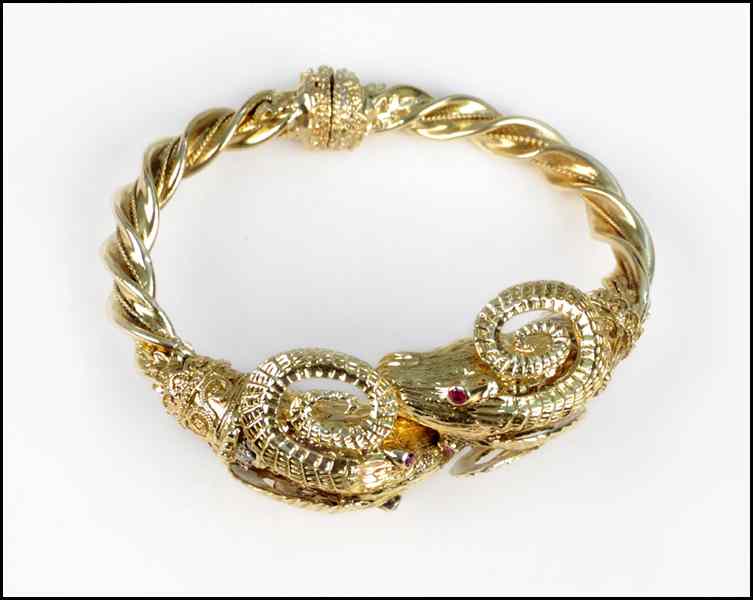 Appraisal: KARAT YELLOW GOLD AND RUBY RAM'S HEAD BRACELET Attributed to