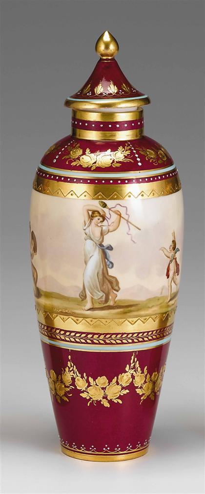 Appraisal: Vienna style porcelain covered vase Decorated with a continuous band