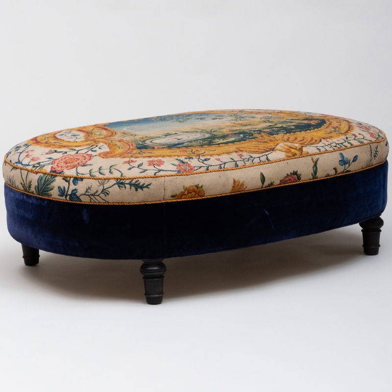 Appraisal: TAPESTRY AND VELVET COVERED OVAL OTTOMAN On ebonized feet x