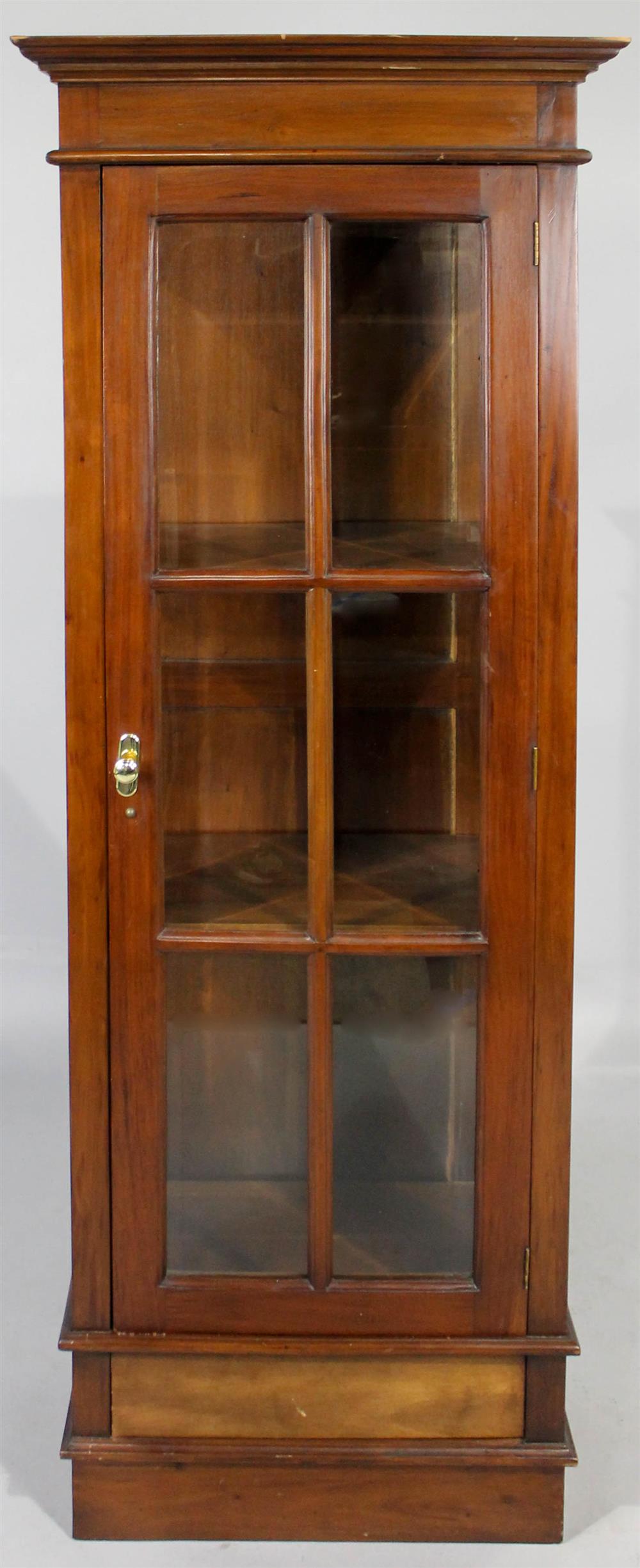 Appraisal: REGENCY STYLE MAHOGANY AND GLASS CURIO CABINET flat pediment above