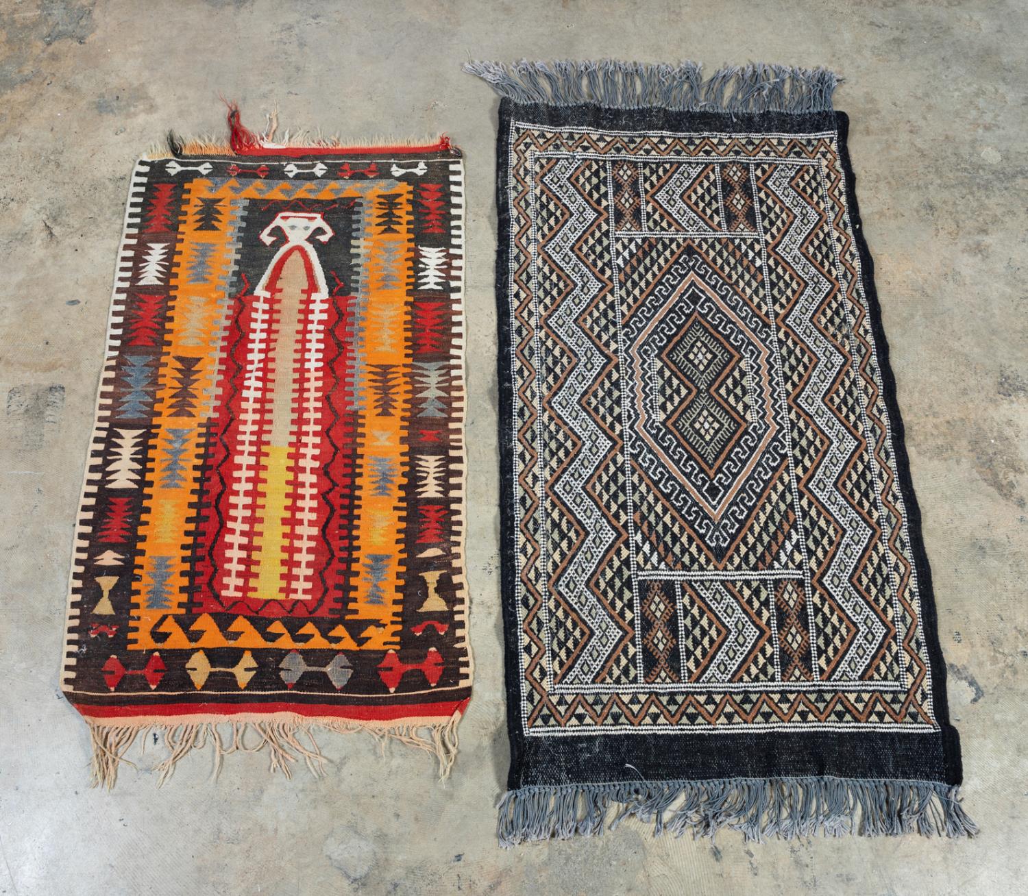 Appraisal: TWO HAND WOVEN WOOL ORIENTAL RUGS LARGER X Two hand