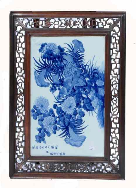 Appraisal: A CHINESE BLUE AND WHITE PORCELAIN PANEL mounted as a