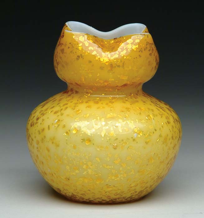 Appraisal: VICTORIAN ART GLASS VASE Amber cased vase with gold mica