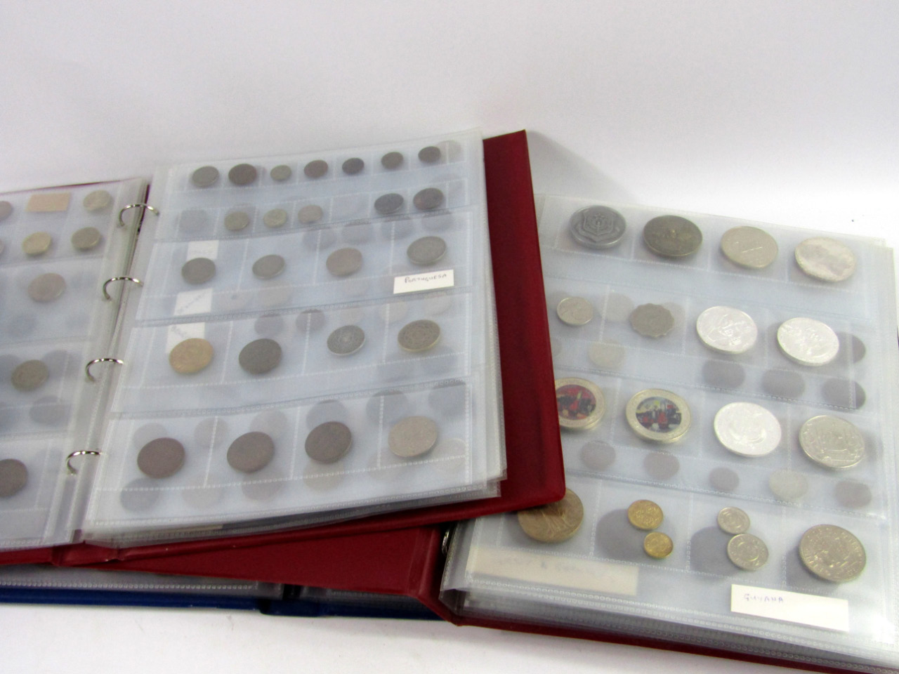 Appraisal: Three albums of European and World coinage some eighteenth century