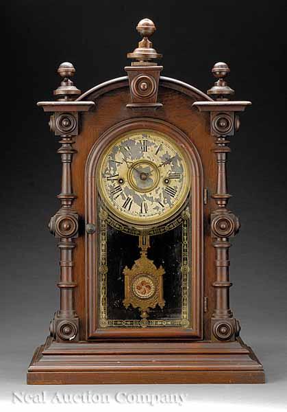 Appraisal: An American Carved Walnut Eight Day Welch Patti Clock c