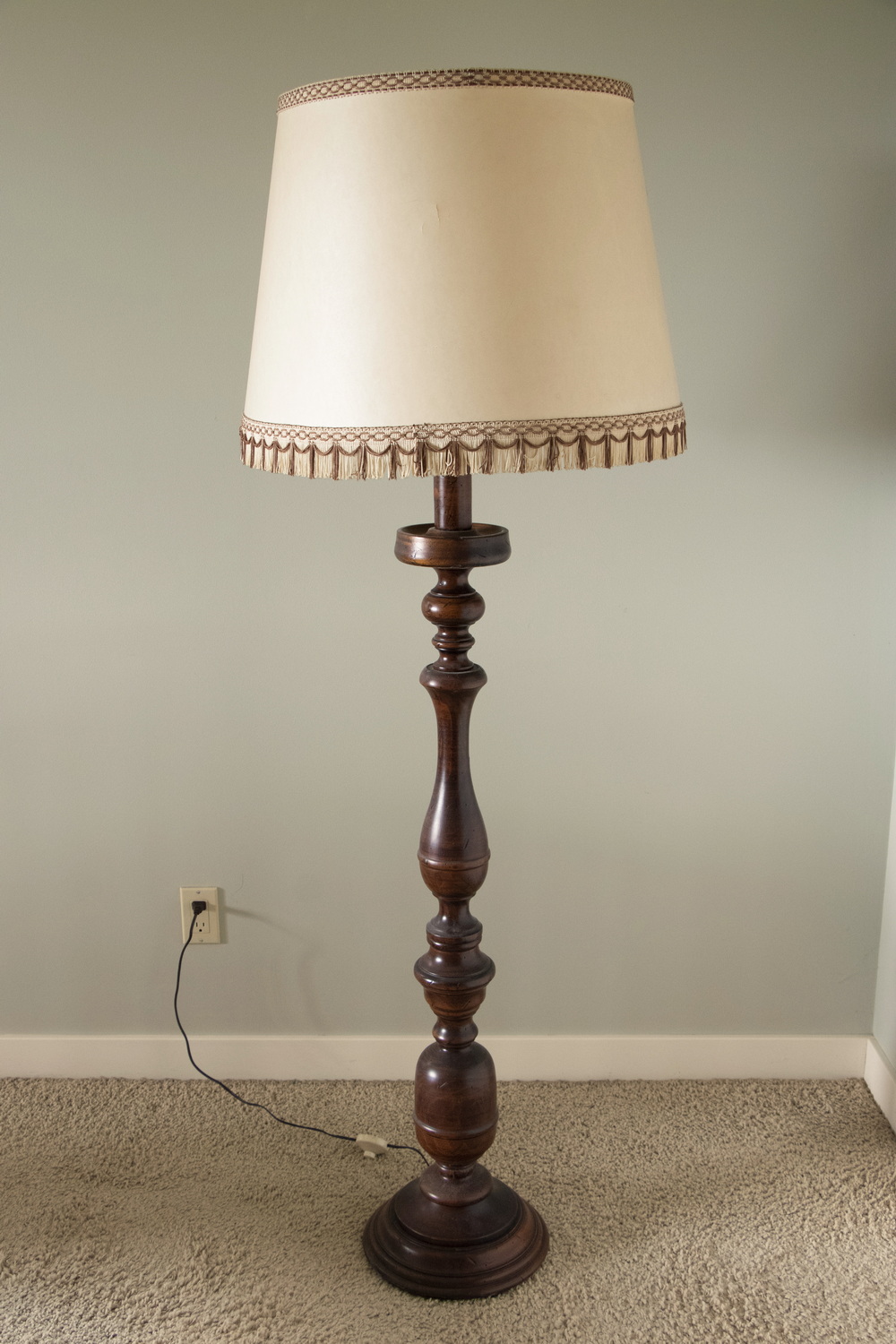 Appraisal: WOOD TURNED FLOOR LAMP A tall room lamp with a