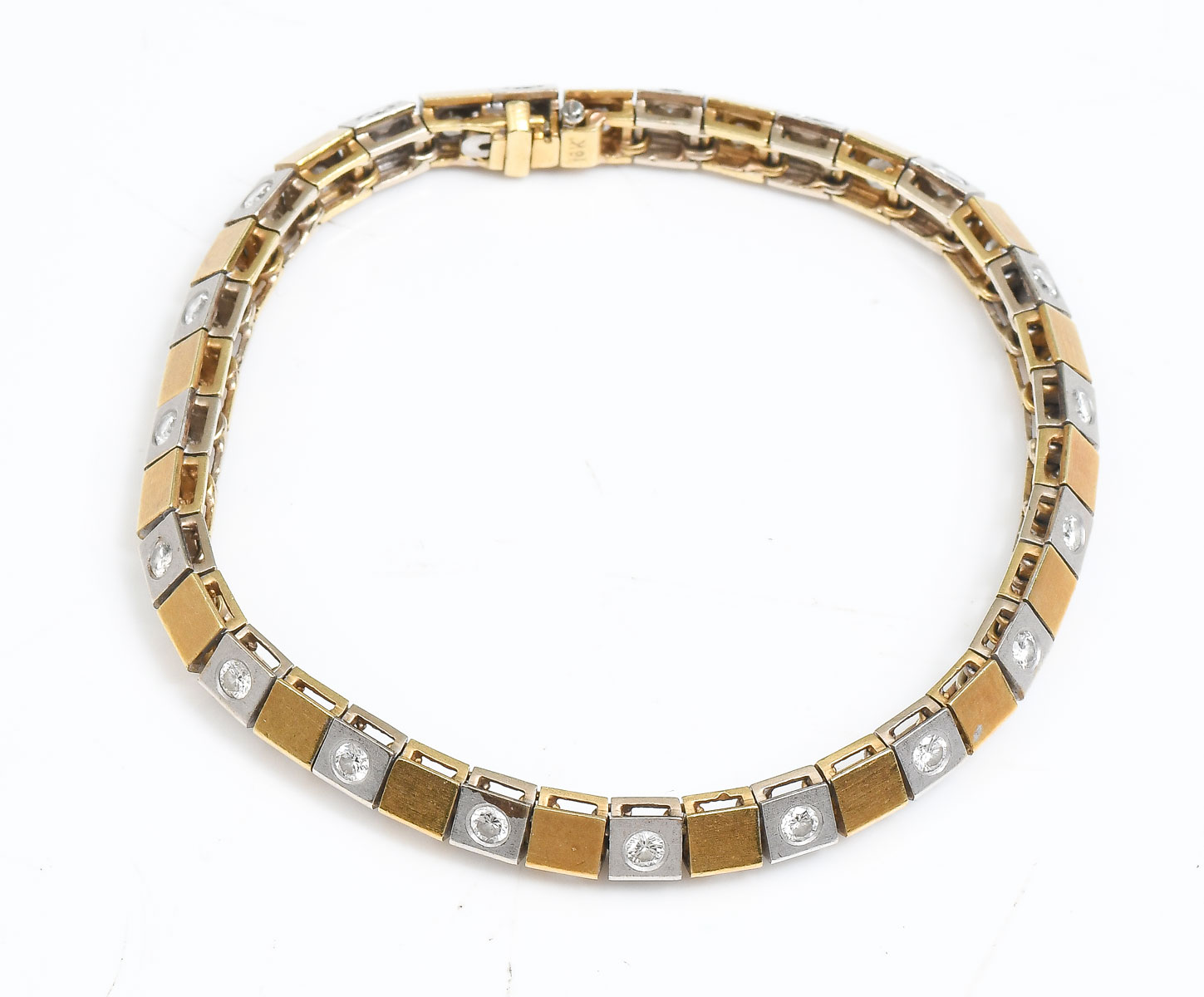 Appraisal: K TONE PYRAMID STYLE BRACELET WITH DIAMONDS round brilliant cut