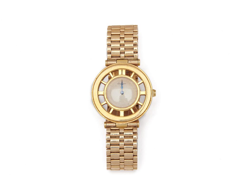 Appraisal: CARTIER K Gold Wristwatch the round white dial framed by