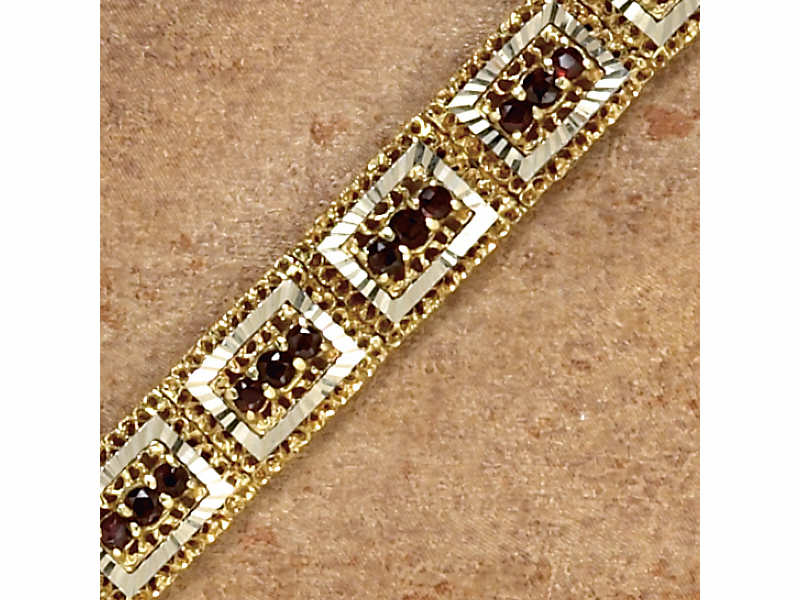 Appraisal: GARNET BRACELET k yellow gold bracelet with white gold diamond