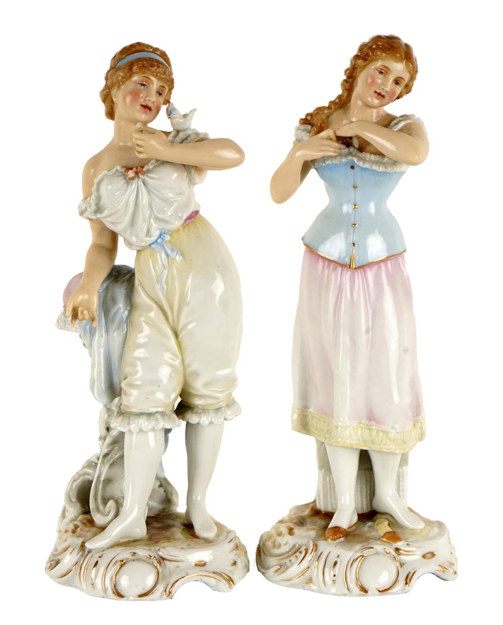 Appraisal: TWO GERMAN PORCELAIN FIGURES OF MAIDENSeach with underglaze blue factory