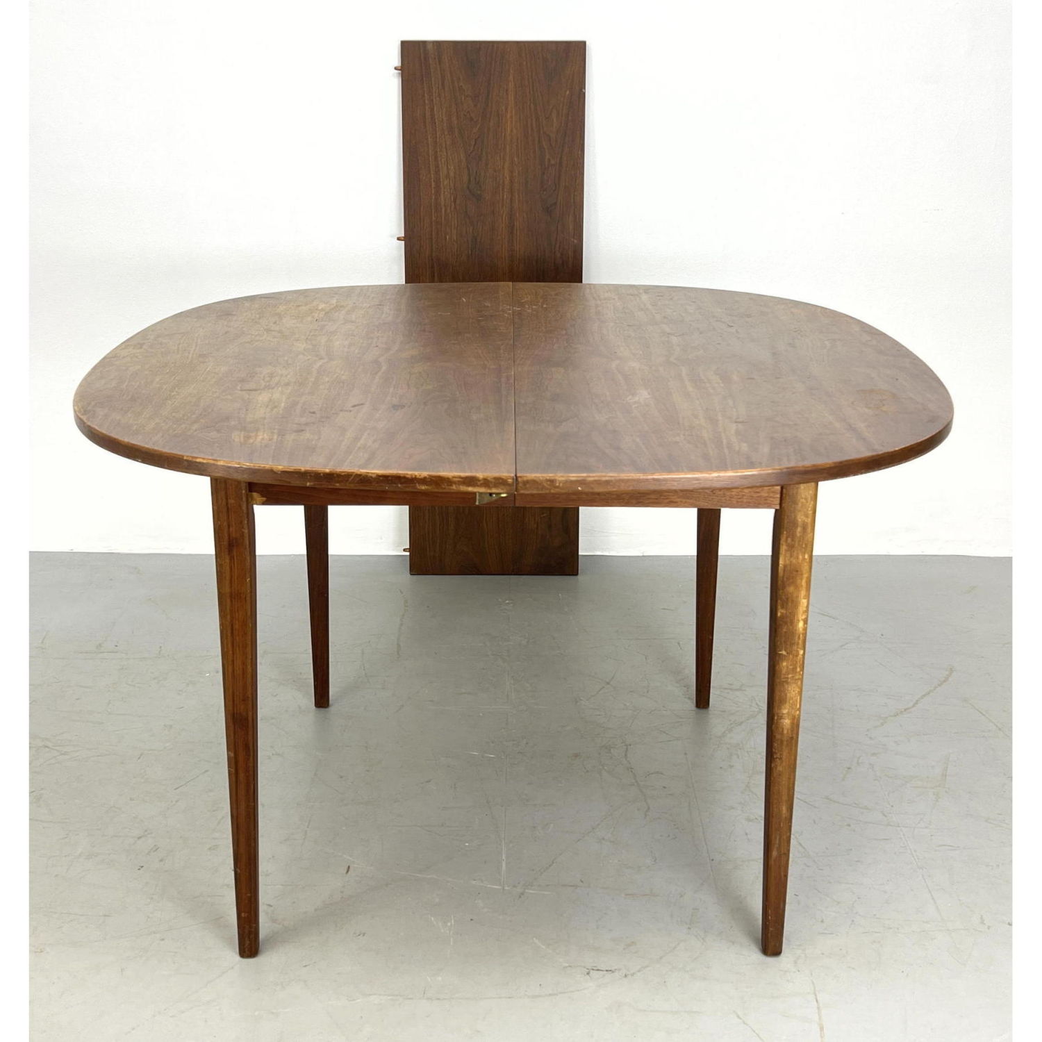 Appraisal: American Modern Walnut Dining Table Long Tapered Legs Includes -