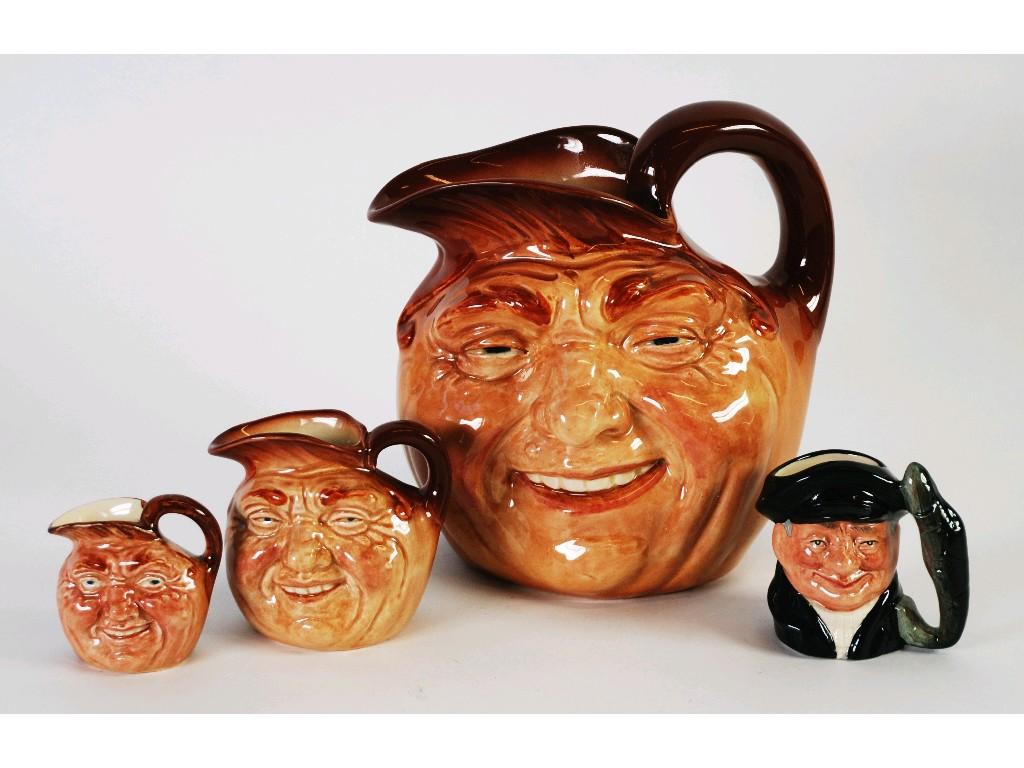 Appraisal: A GRADUATED SET OF THREE JOHN BARLEYCORN CHARACTER JUGS cm