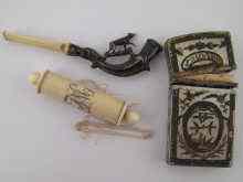 Appraisal: An ivory and white metal cigarette holder a French silver