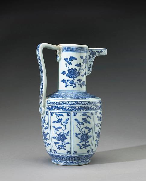 Appraisal: A rare blue and white porcelain ewer Qianlong The barrel-shaped