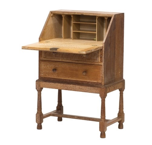 Appraisal: A th century limed oak bureau by 'Heals Tottenham Court