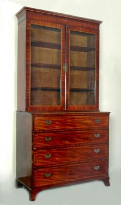 Appraisal: A GEORGE III MAHOGANY SECRETAIRE CABINET crossbanded with stringing moulded