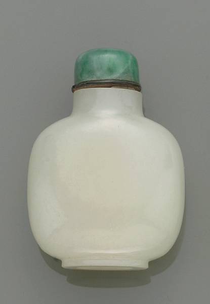 Appraisal: A white jade snuff bottle th Century Of flattened globular