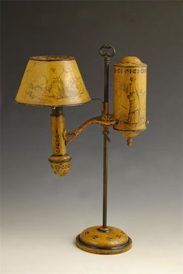 Appraisal: A tole peinte adjustable reading lamp of colza form decorated