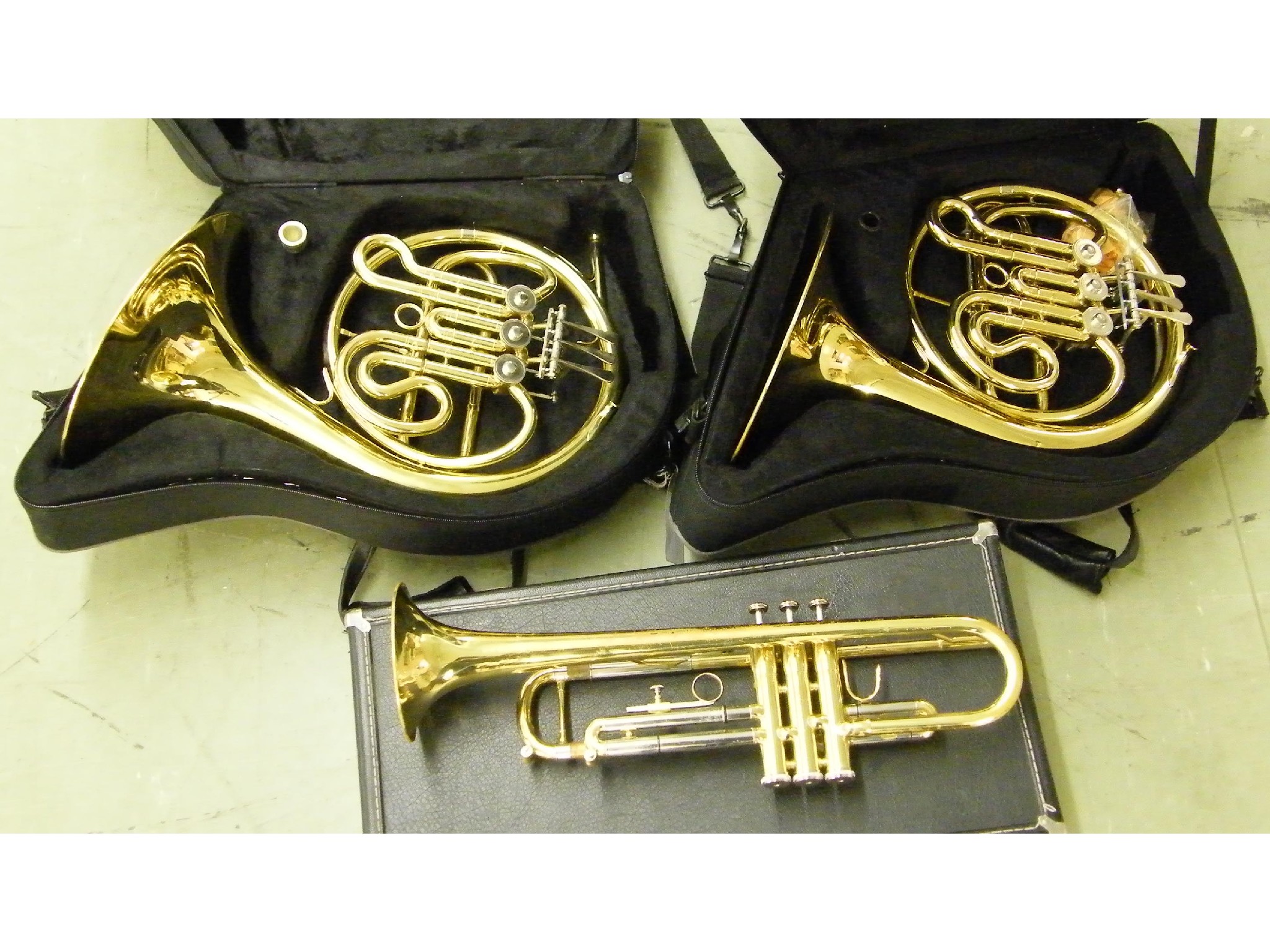 Appraisal: Two Elkhart BFH French horns both cased together with a