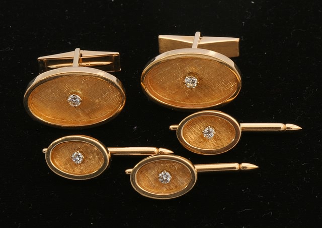 Appraisal: KY Cuff links and buttons with diamond accent in center