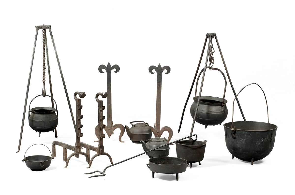 Appraisal: TWO SIMILAR WROUGHT-IRON TRIPOD KETTLE STANDS WITH CHAIN TRAMMELS AND