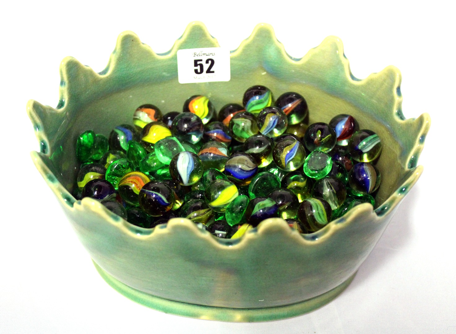 Appraisal: A large collection of vintage glass marbles in an oval