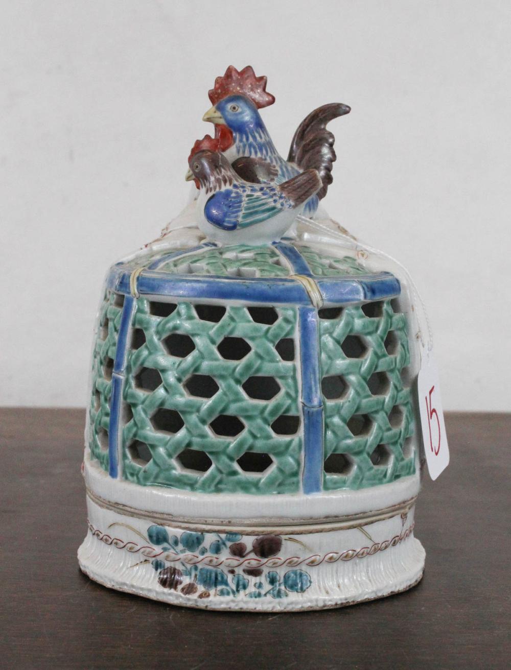 Appraisal: FIGURAL PORCELAIN LIDDED DISH featuring a domed lid with pierced