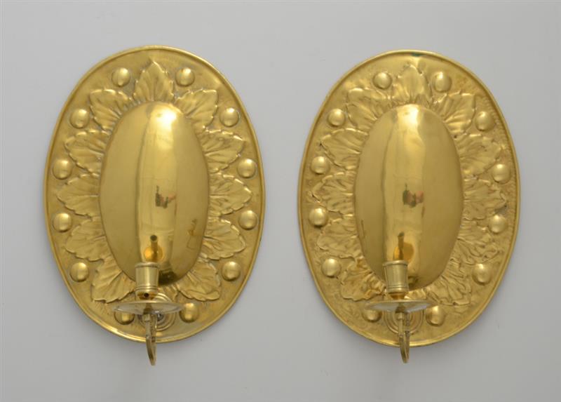 Appraisal: PAIR OF BAROQUE STYLE REPOUSSE BRASS SINGLE-ARM WALL APPLIQUES Each