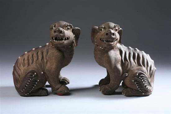 Appraisal: PAIR JAPANESE BROWN STONEWARE FIGURE OF SHI SHI With white