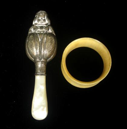 Appraisal: Mo Ther-of-pearl handled Humpty-Dumpty infant's rattle early th century