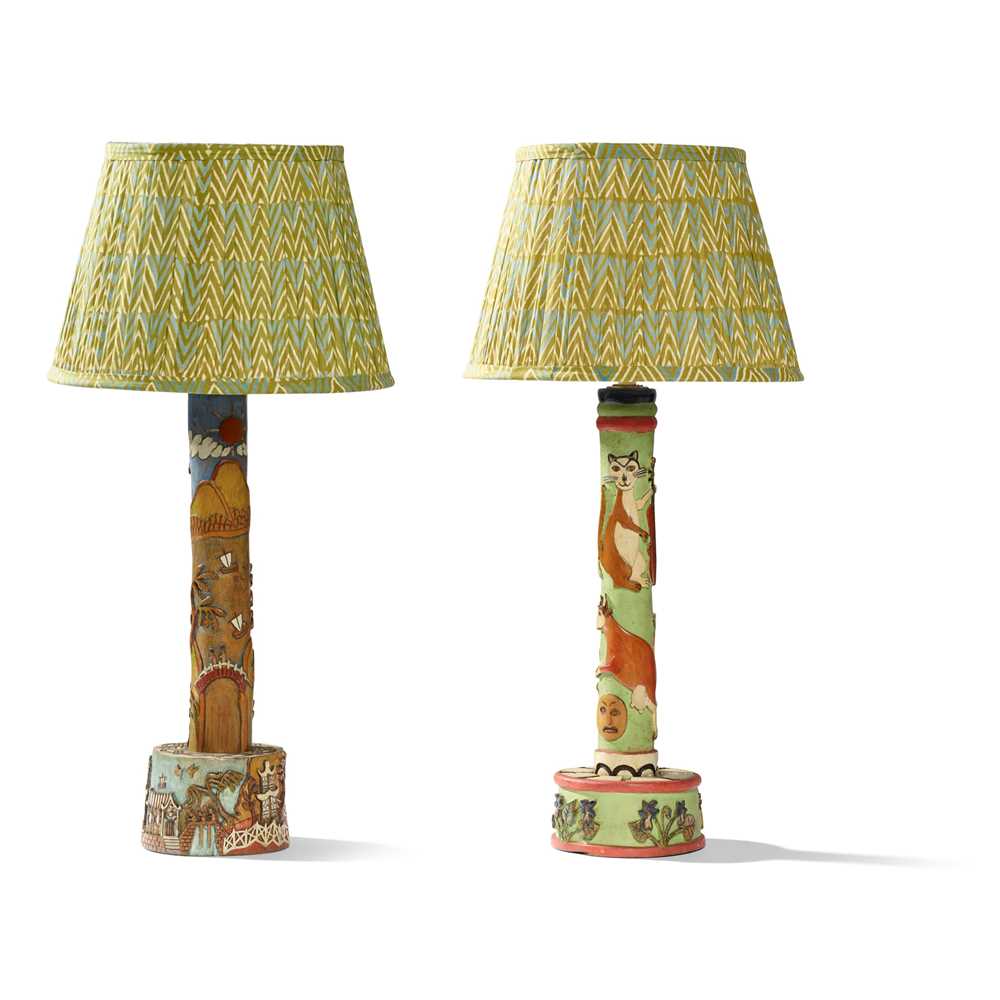 Appraisal: J T BARLOW BIDDULPH PAIR OF FOLK ART TABLE LAMPS