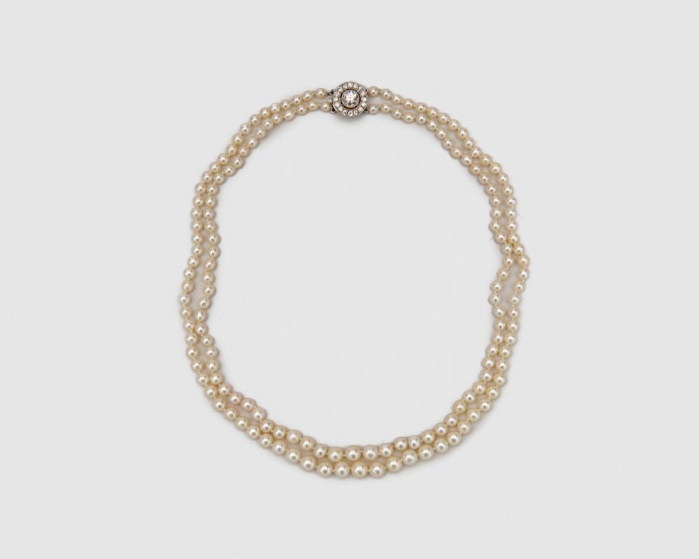 Appraisal: Double Strand Natural Pearl Necklace with Platinum and Diamond Clasp